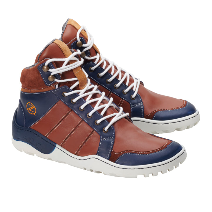 Wir präsentieren die MONTBLANQ Orange Waterproof Sneaker von ZAQQ, ein stilvolles Paar High-Tops mit Einsätzen aus marineblauem, braunem und hellbraunem Leder. Sie haben weiße Schnürsenkel und Sohlen, ein Logo an der Seite und bieten Komfort durch einen gepolsterten Knöchelbereich. Außerdem sind sie wasserdicht und somit noch praktischer.